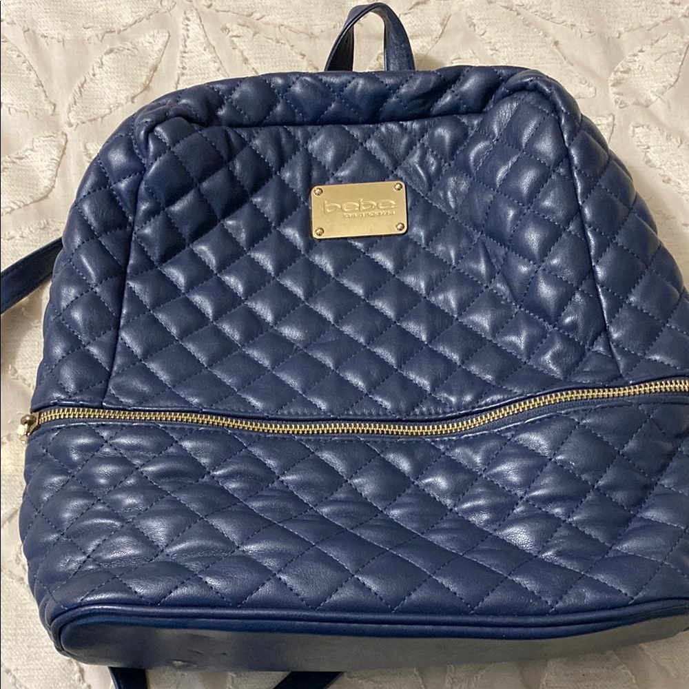 Bebe Blue Quilted Backpack with Gold Accents